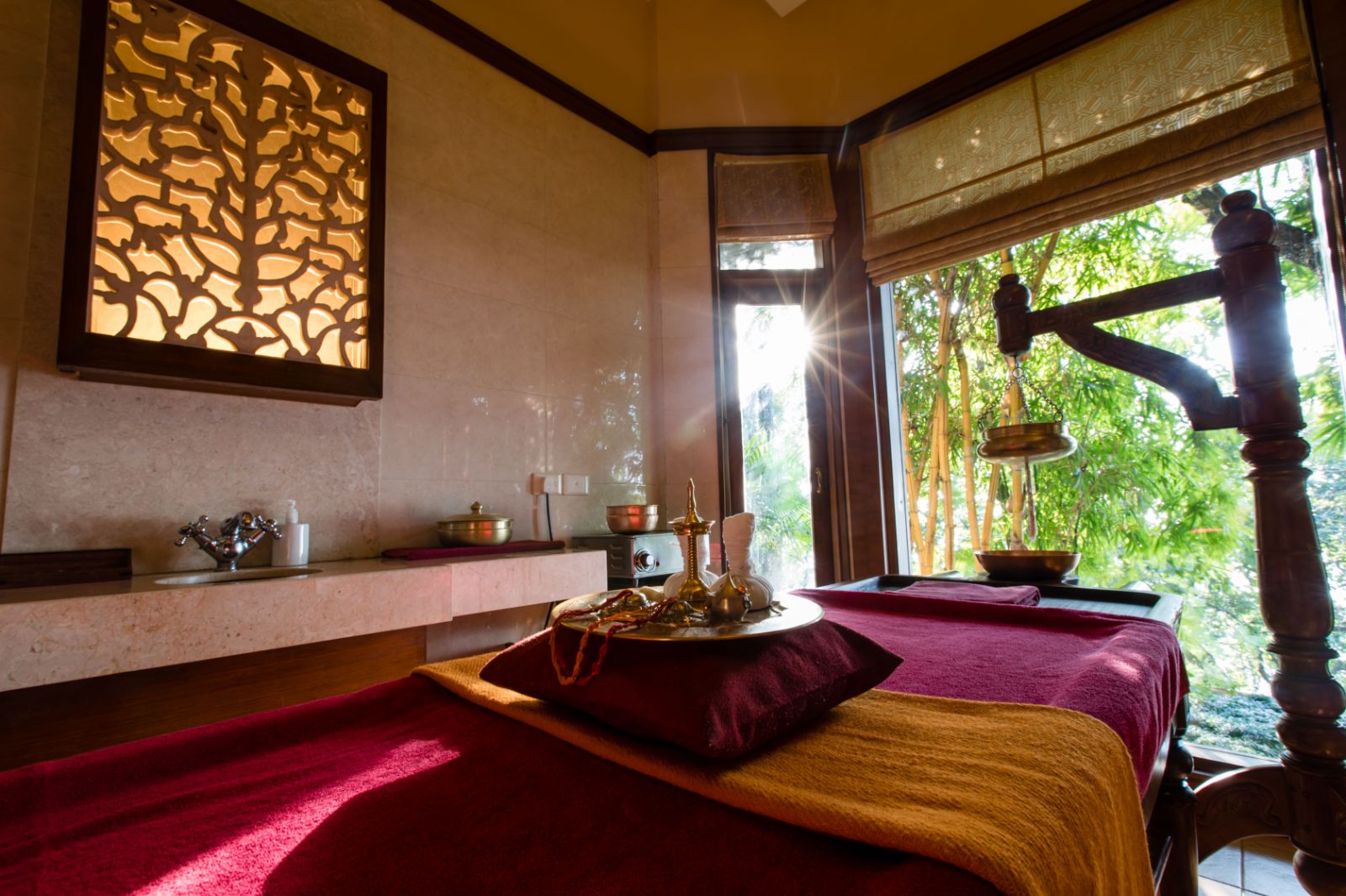 Calming spa treatment room with traditional Indian experiences in luxury hotel in India.