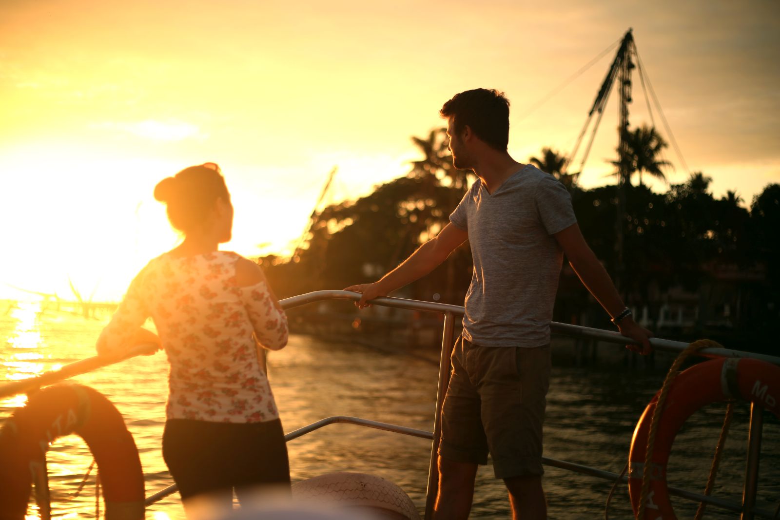 Guests on a sunset cruise from the Brunton Boatyard hotel in Cochin India