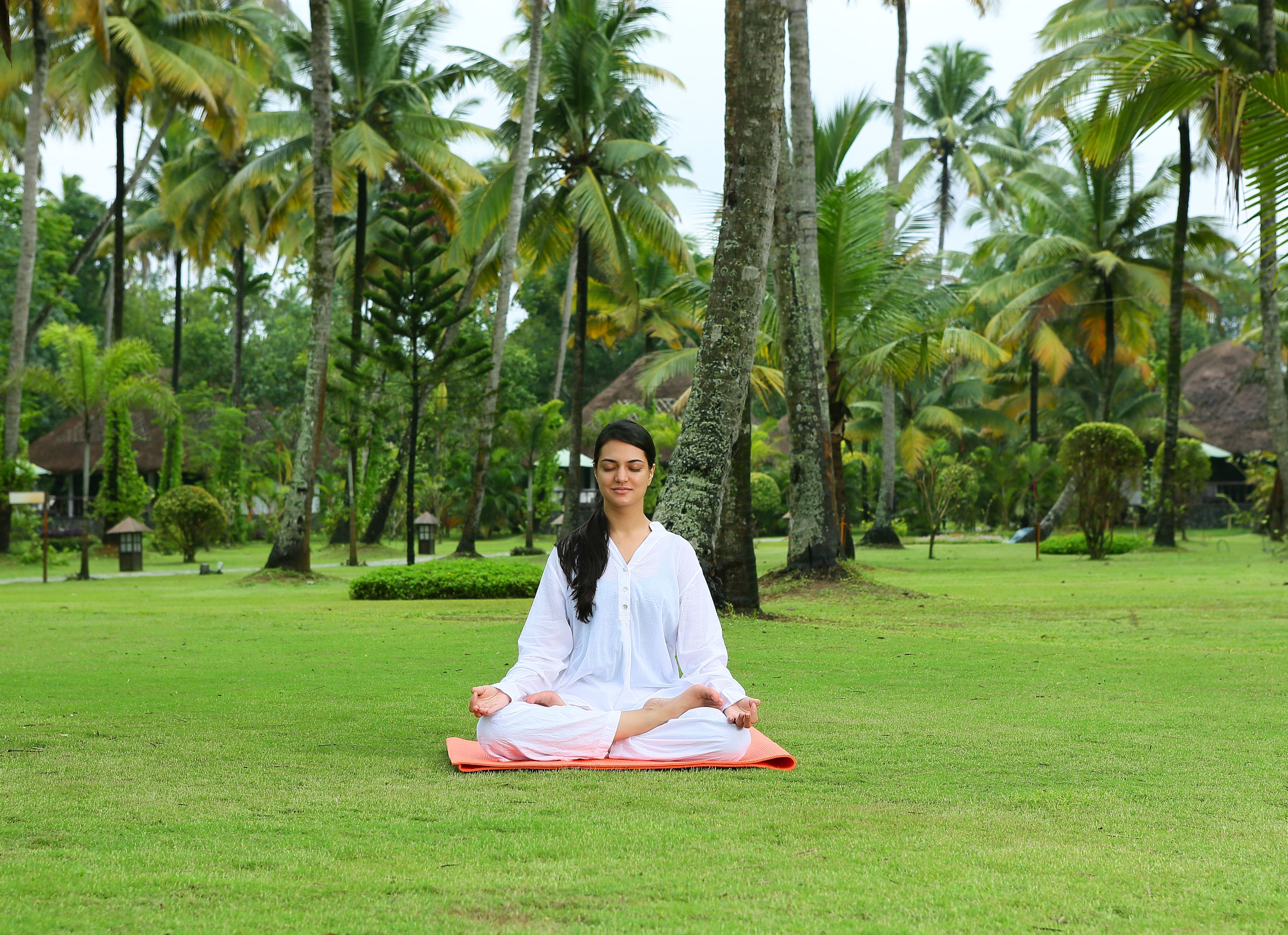 woman meditating at Carnoustie, India