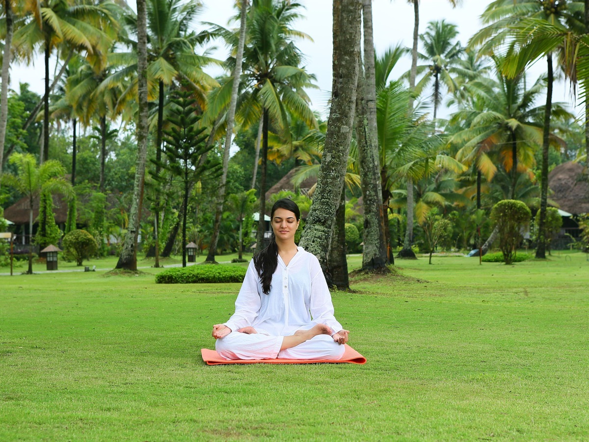woman meditating at Carnoustie, India