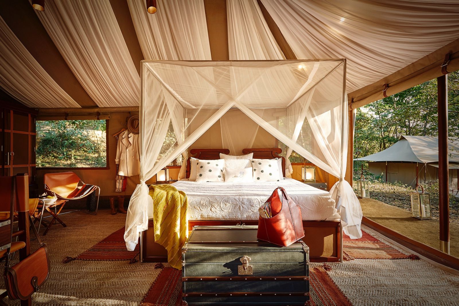 A four poster bed inside a tented bedroom at the Kohima Camp located at the foothills of  Japfu Mountain in Nagaland, India