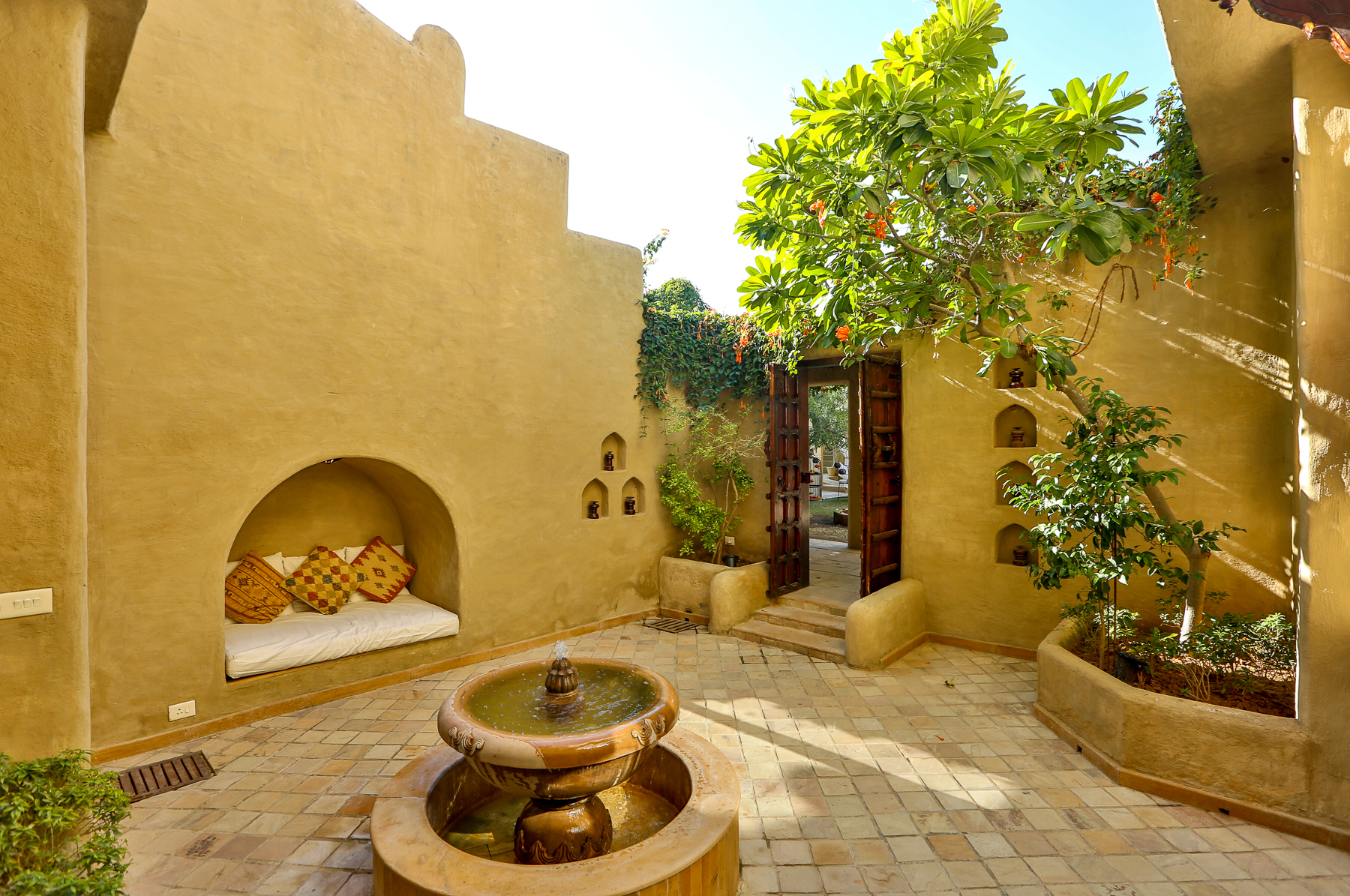 Alishan suite courtyard at Mihir Garh in India