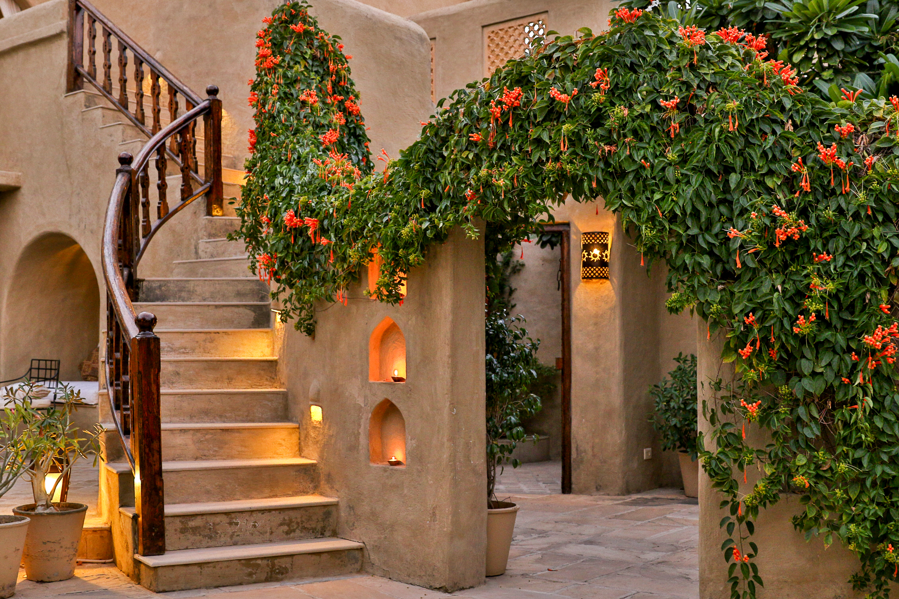 Stairs and flowers in the courtyard of Mihir Garh in India