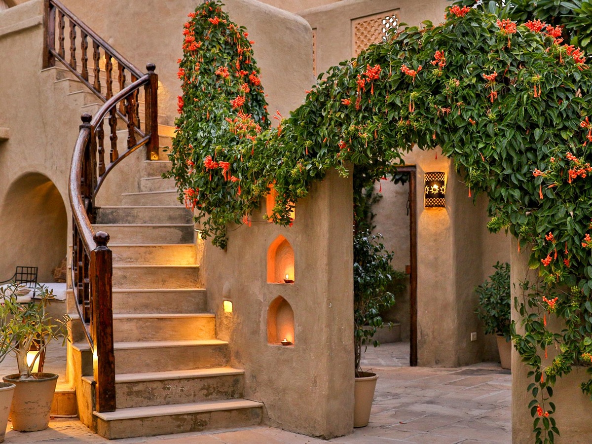 Stairs and flowers in the courtyard of Mihir Garh in India