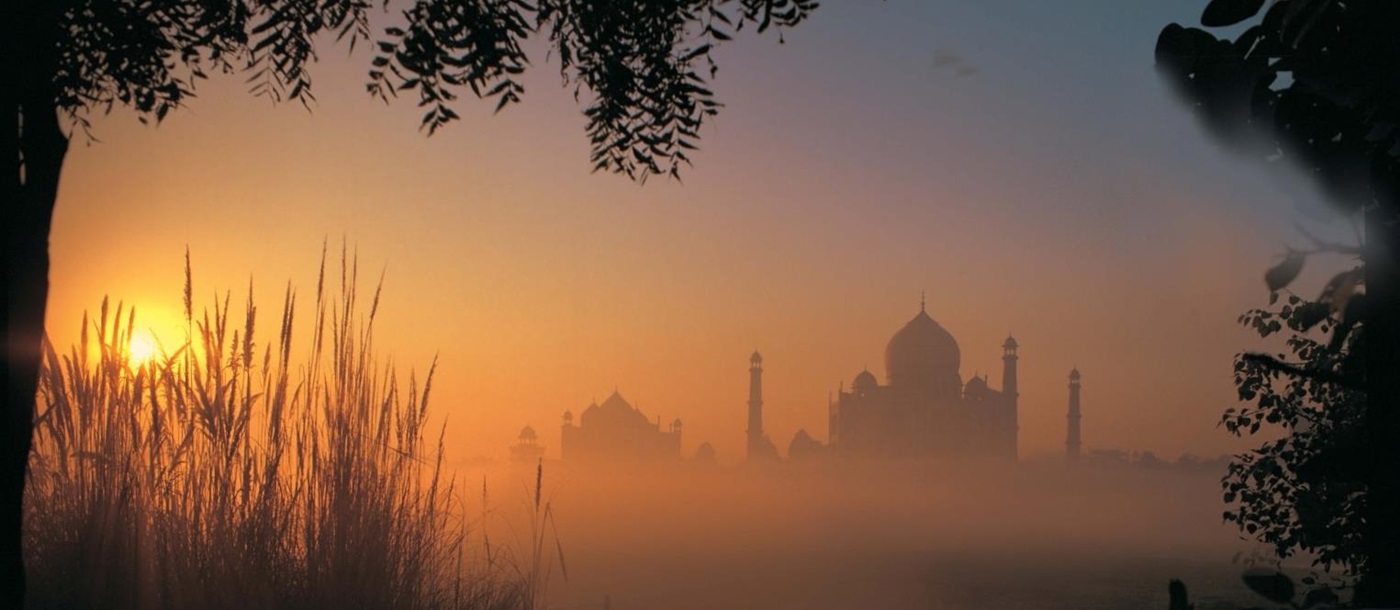 Sunrise view of the Taj Mahal from the Oberoi Amarvilas 