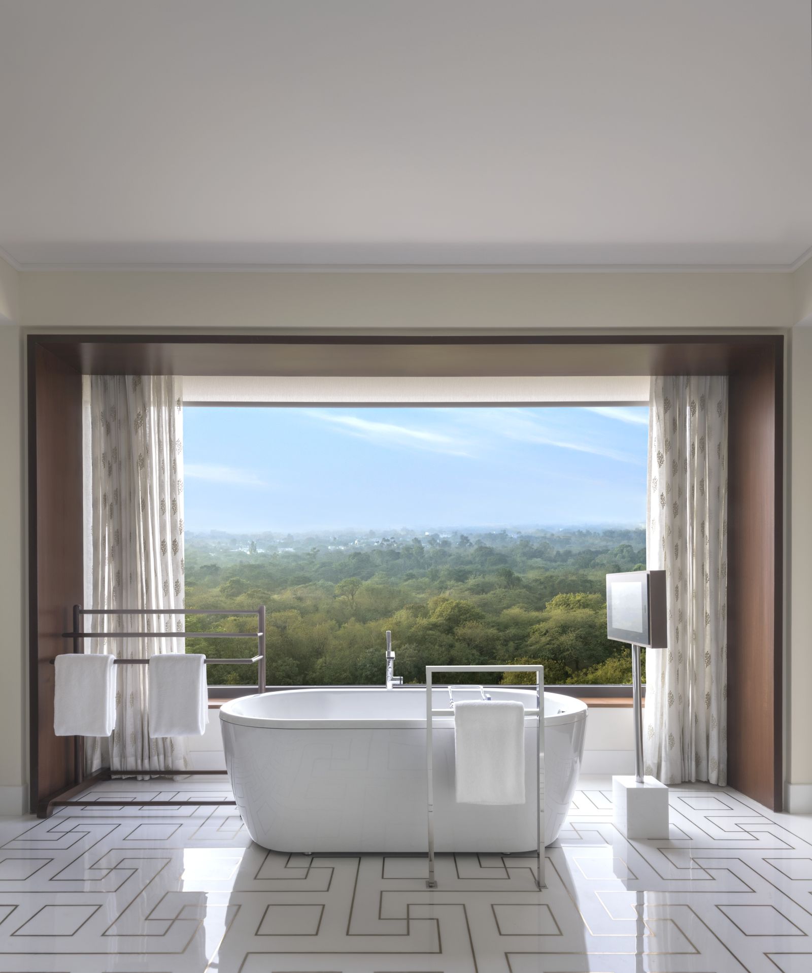 Bath tub with views in a suite at the Oberoi Hotel Delhi