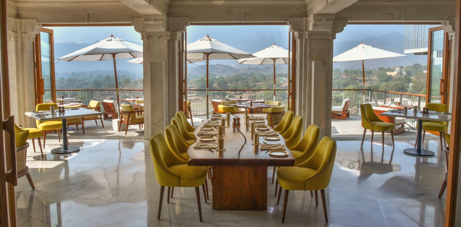 Restaurant and views of the Aravalli Hills at the Raas Devigarh near Udaipur India