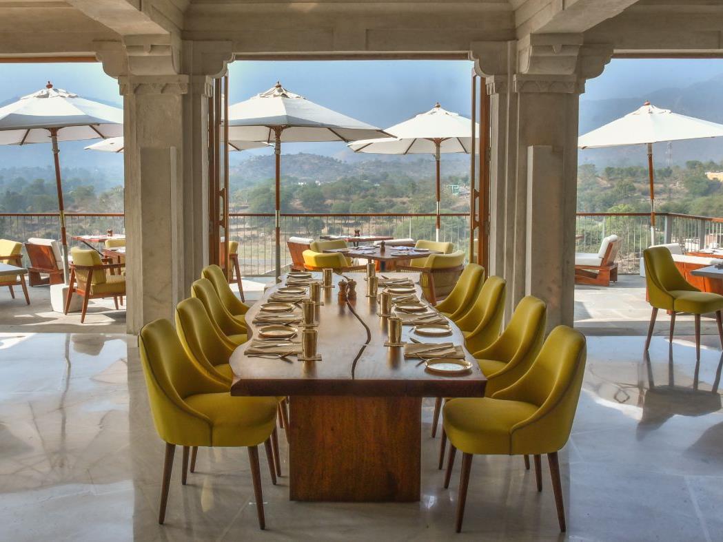 Restaurant and views of the Aravalli Hills at the Raas Devigarh near Udaipur India