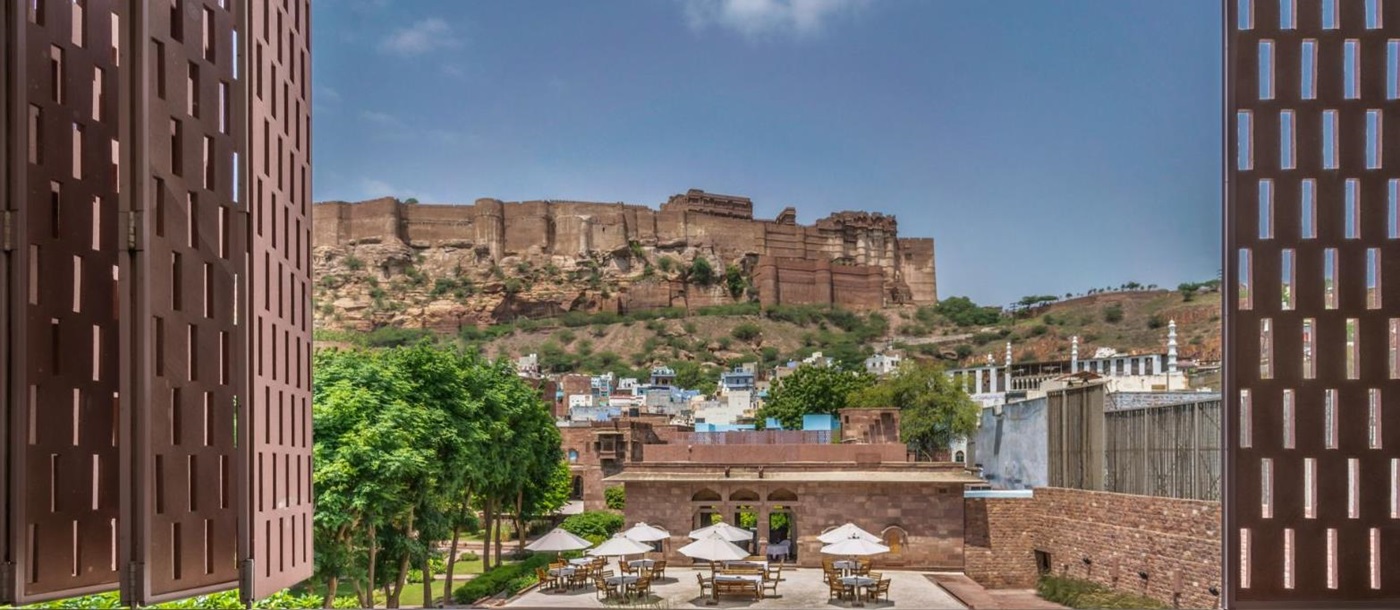 Suite balcony with views of Mehrangarh Fort at RAAS Jodhpur in the Rajasthan region of India
