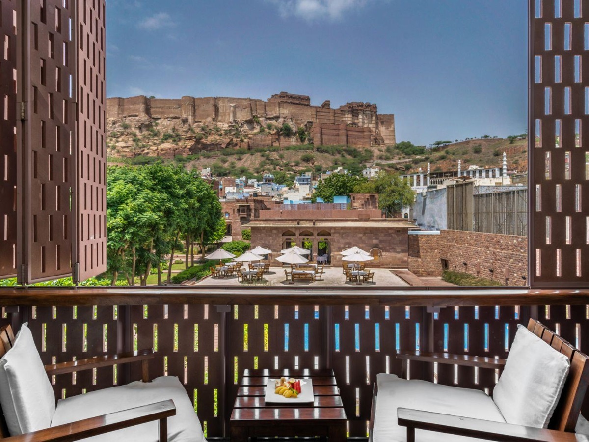 Suite balcony with views of Mehrangarh Fort at RAAS Jodhpur in the Rajasthan region of India