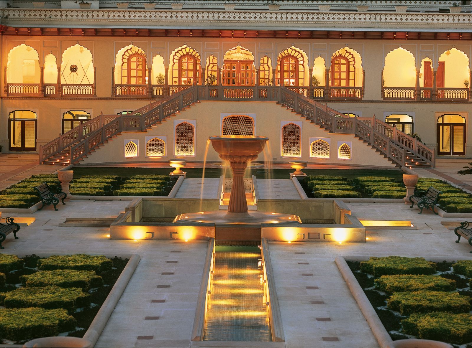Illuminated courtyard at the Rambagh Palace in Jaipur