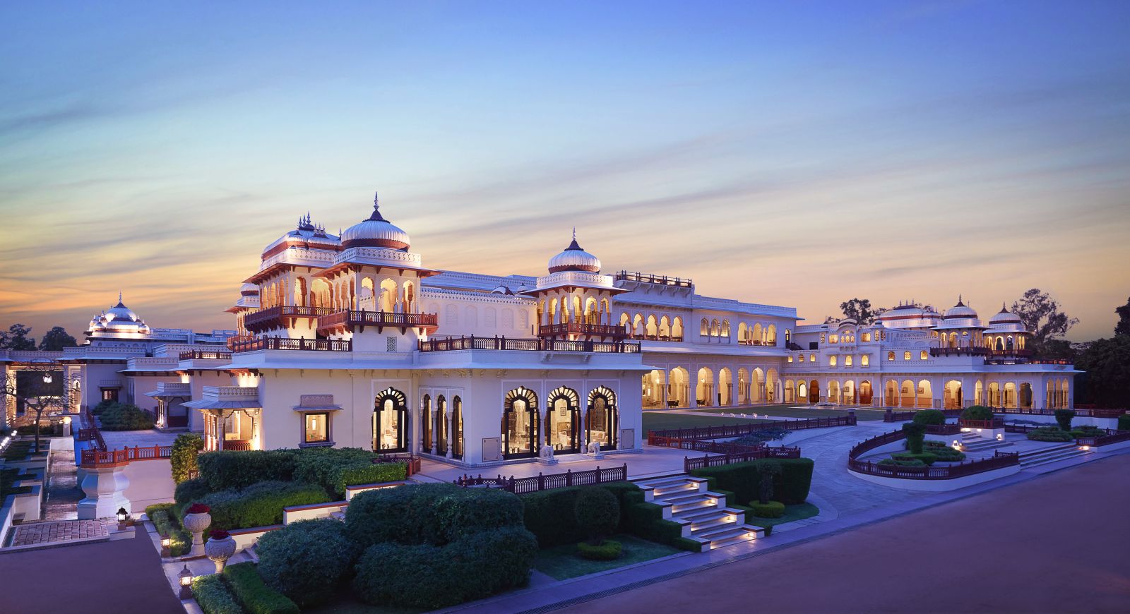 The Rambagh Palace in Jaipur illuminated at dusk