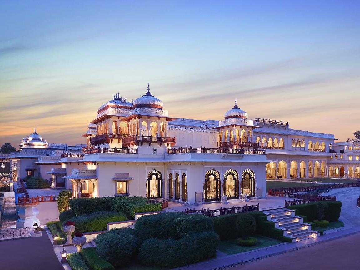 The Rambagh Palace in Jaipur illuminated at dusk