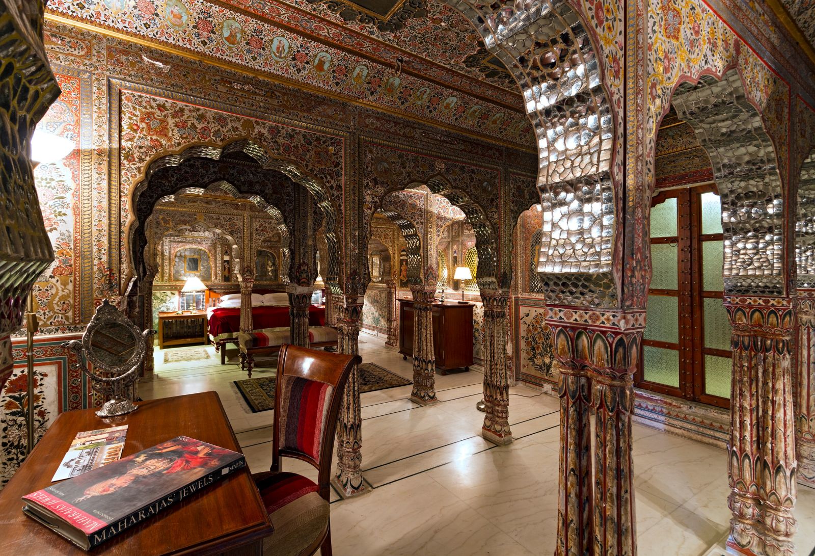 Ornate decor of a suite at the Samode Haveli hotel in Jaipur India