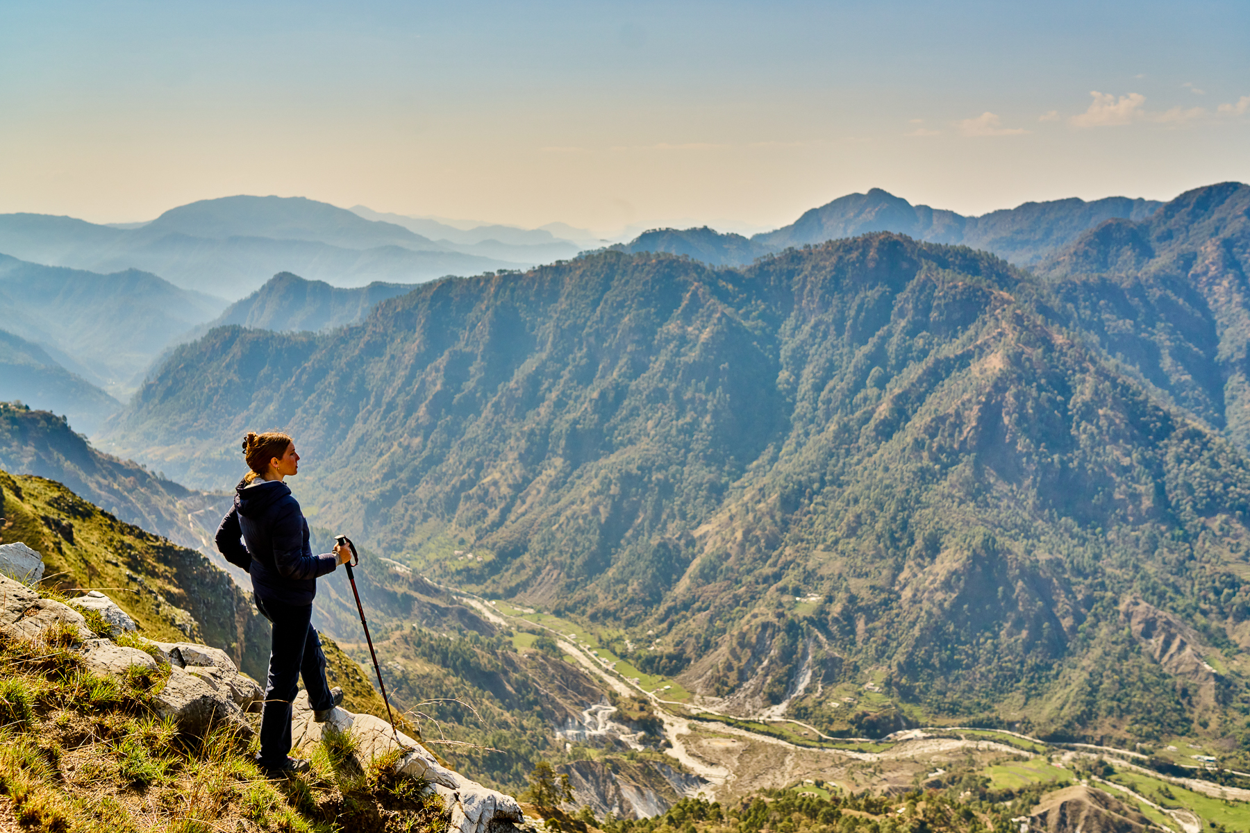 A woman hiking near Shakti Prana in Uttarakhand
