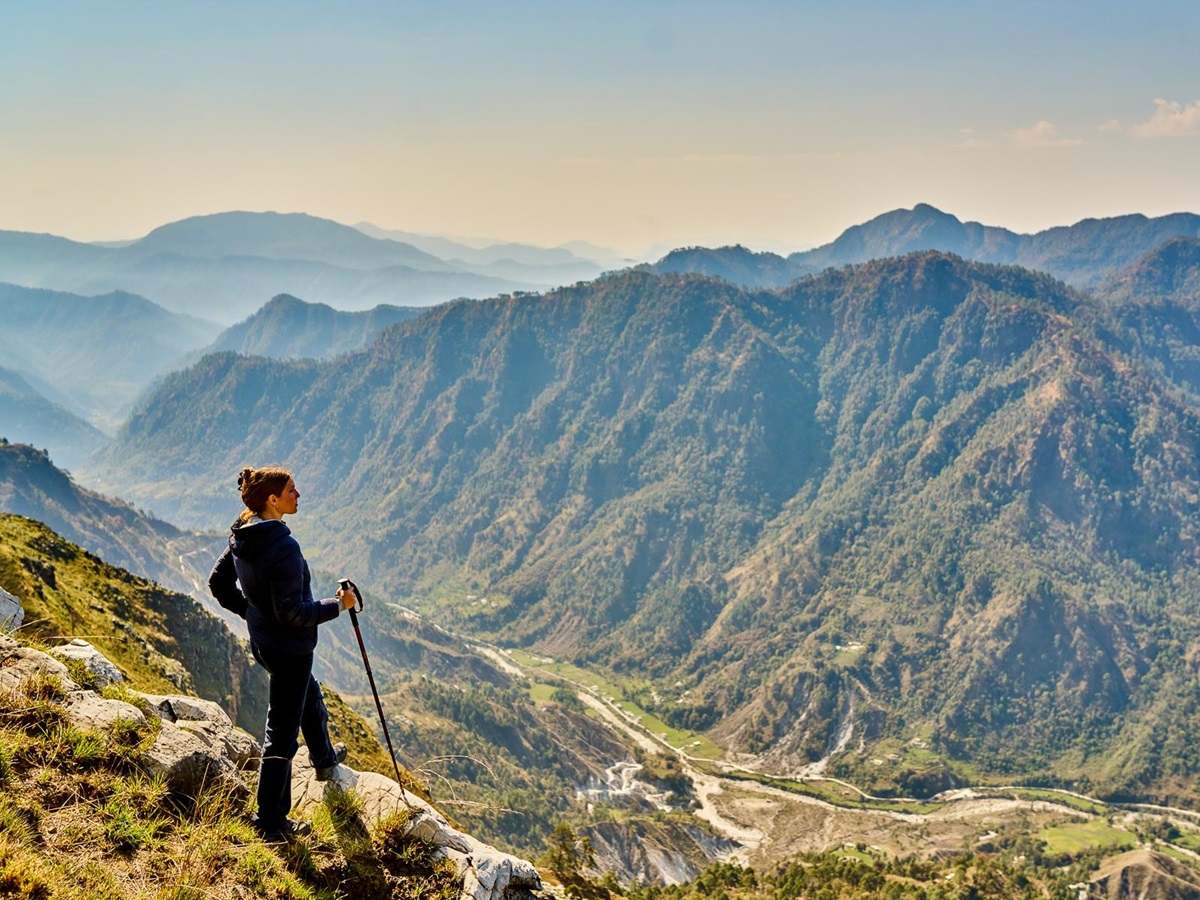 A woman hiking near Shakti Prana in Uttarakhand