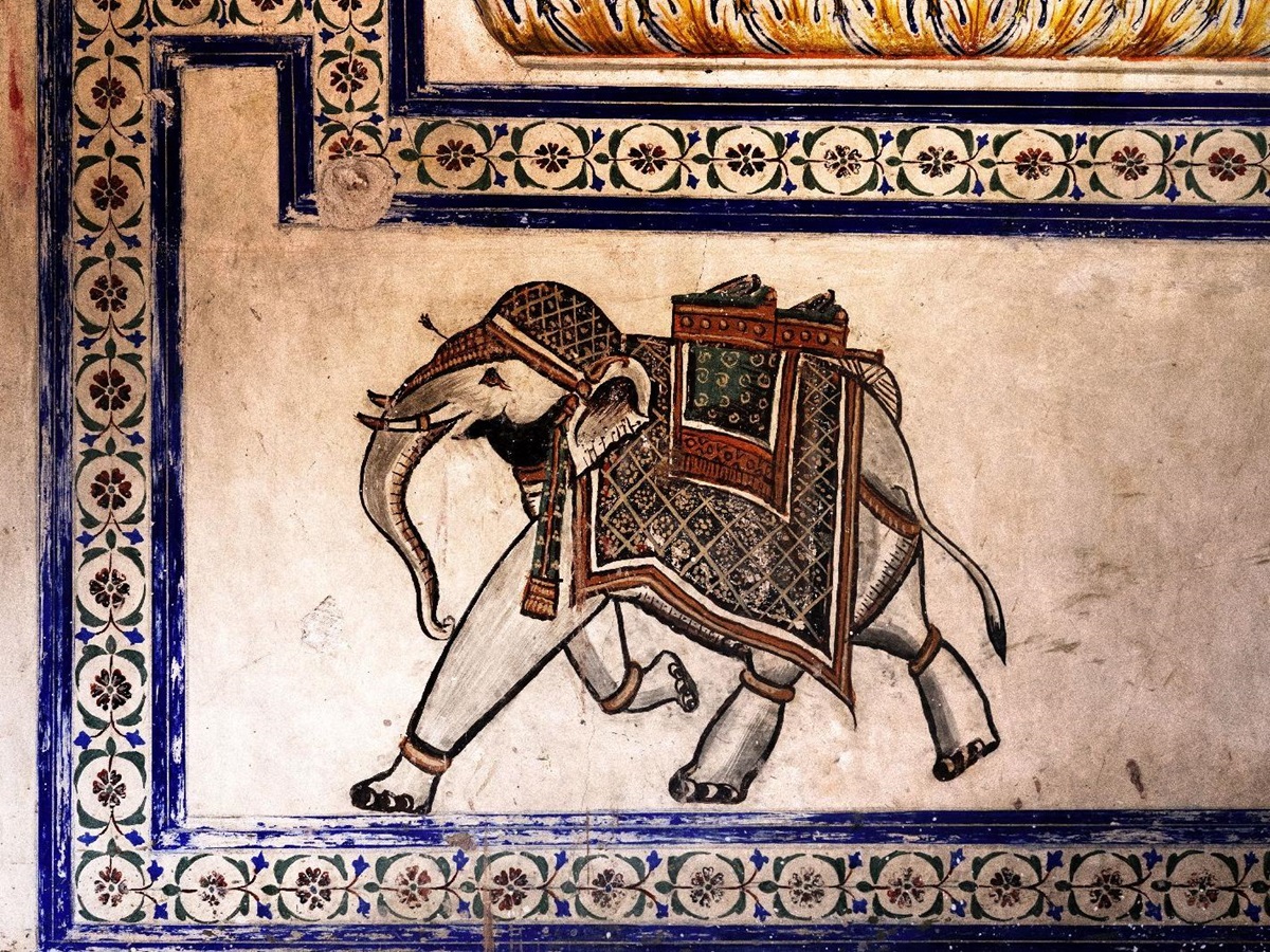 Detail of an intricate painting within the temple at Six Senses Fort Barwara near Rathambore India
