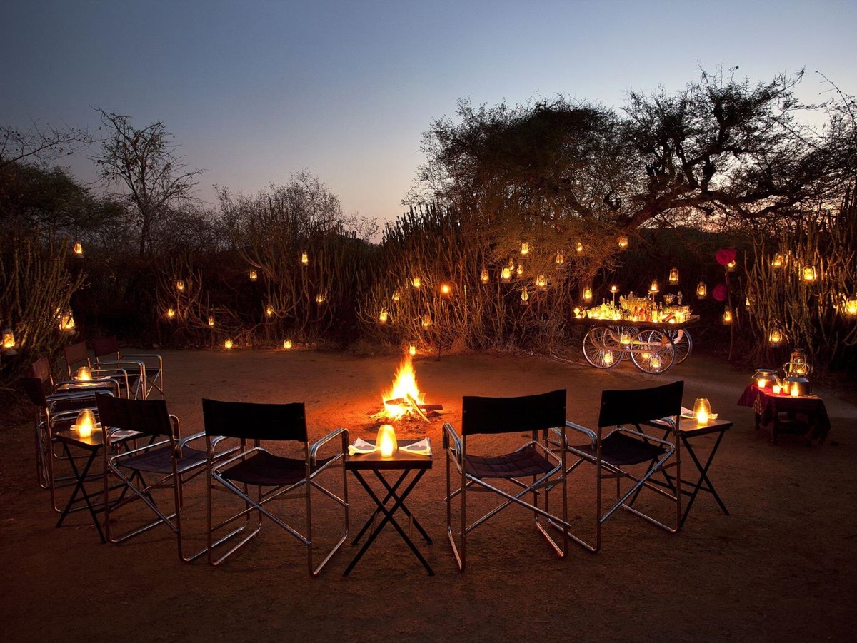 Campfire drinks at Sujan Jawai leopard camp in India