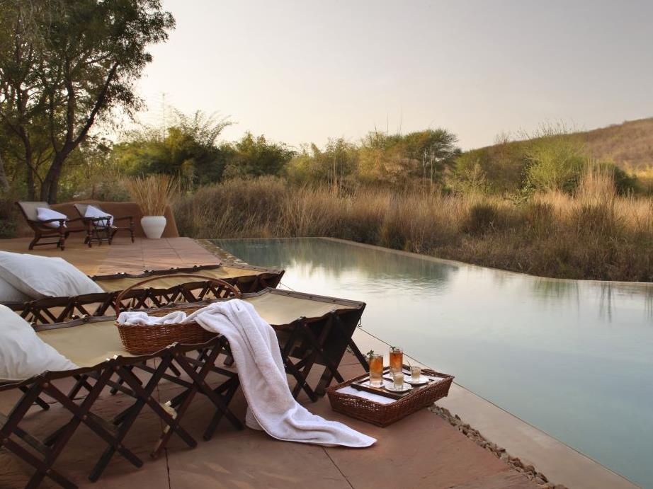 Pool terrace at the Sujan Sher Bagh luxury camp in India