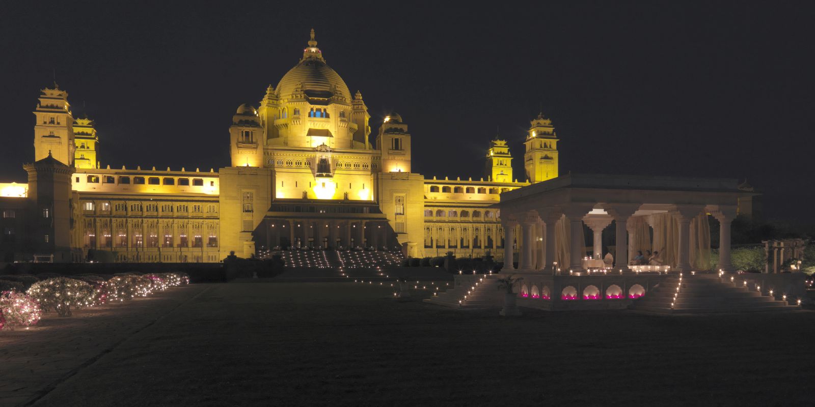 The Umaid Bhawan hotel in Jodhpur illuminated at night