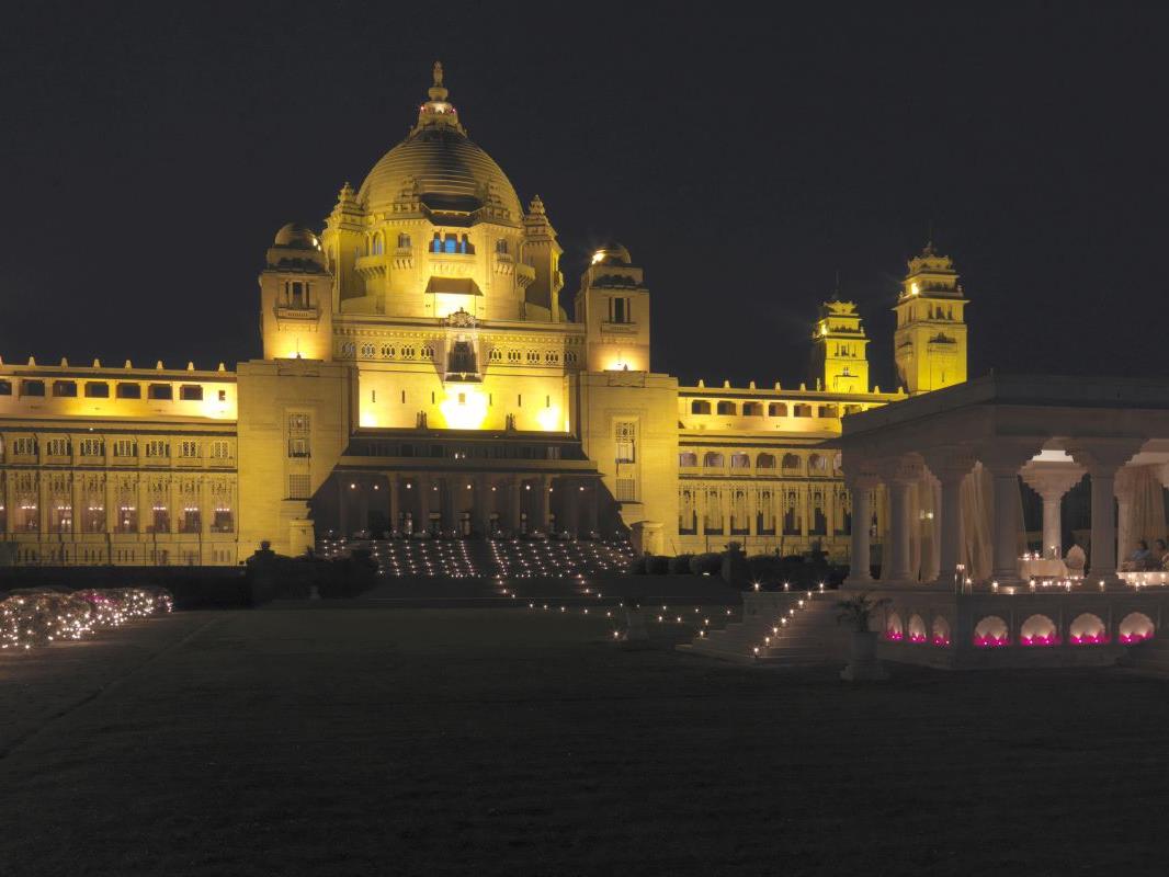 The Umaid Bhawan hotel in Jodhpur illuminated at night