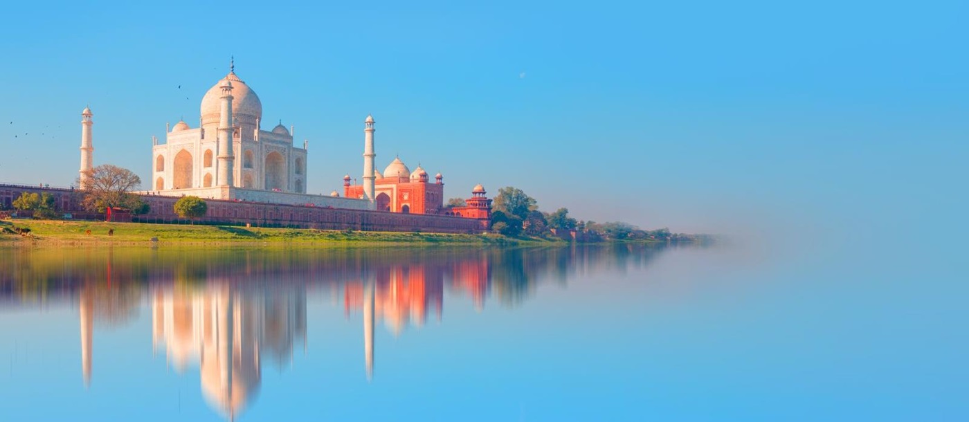 Distant view of the Taj Mahal in reflection