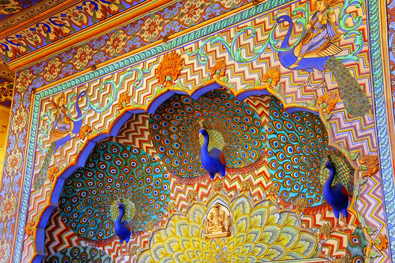 Brightly coloured and intricate interior details of Peacock Gate in Jaipur, Rajasthan
