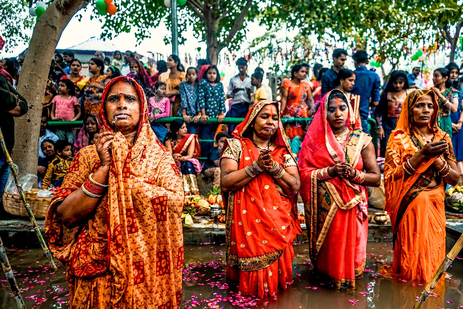 Indian women bathing in Haridwar river during Kumbh Mela festival