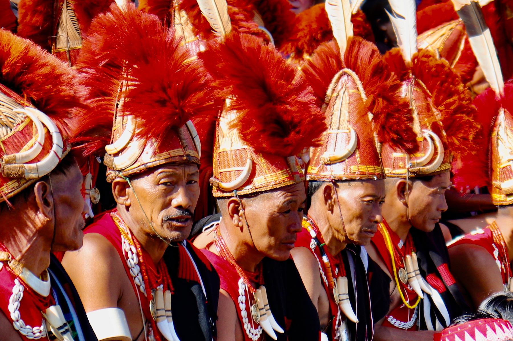 Men dressed in ceremonial uniform at the Hornbill Festival in Nagaland