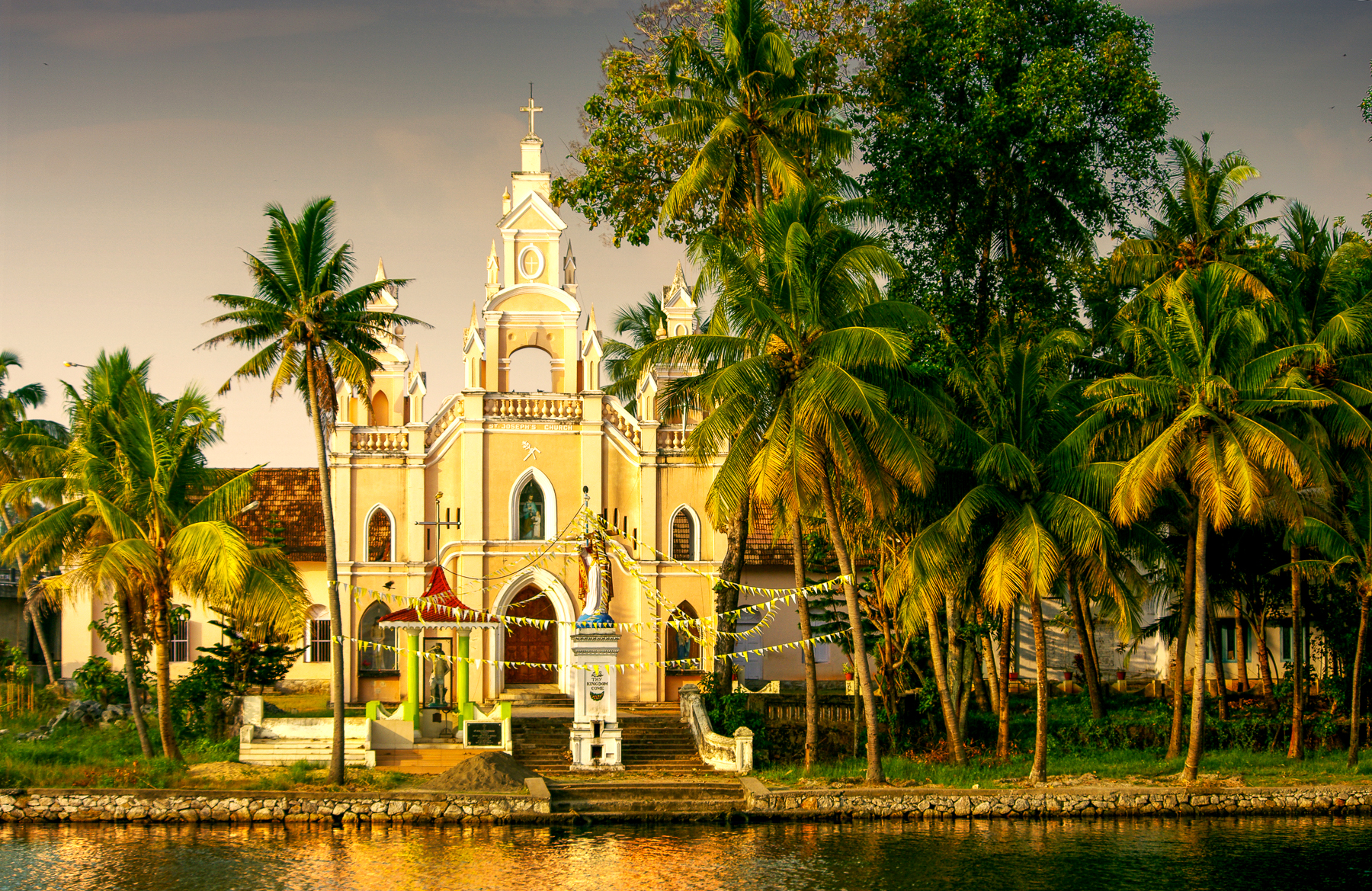Exterior view of a church on the river in Kerala