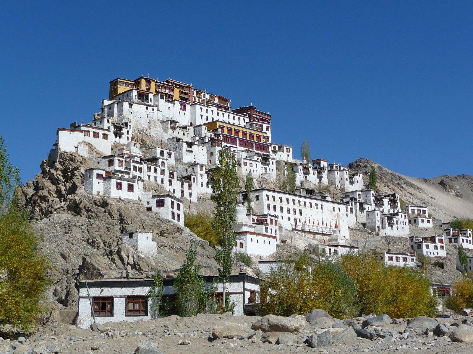 Towering monastery on a rocky mountain in Ladakh, India