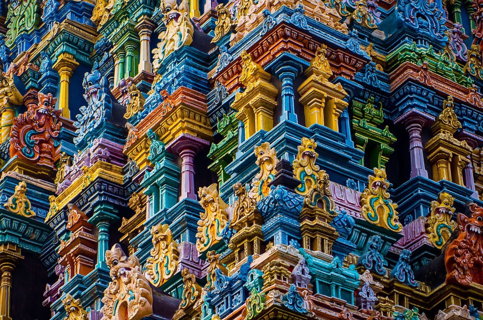Detail of the intricate carvings on the pillars of Meenakshi temple in Madurai India