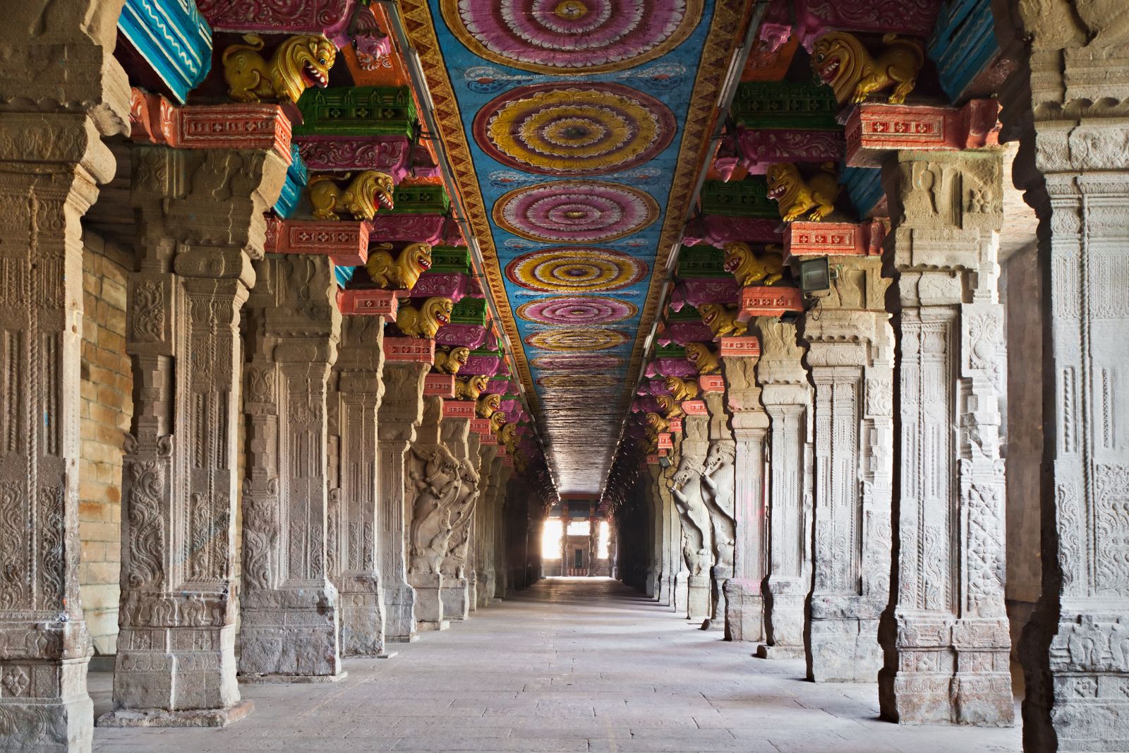 Columns and colourful ceiling paintings at Meenakshi temple in Madurai, India