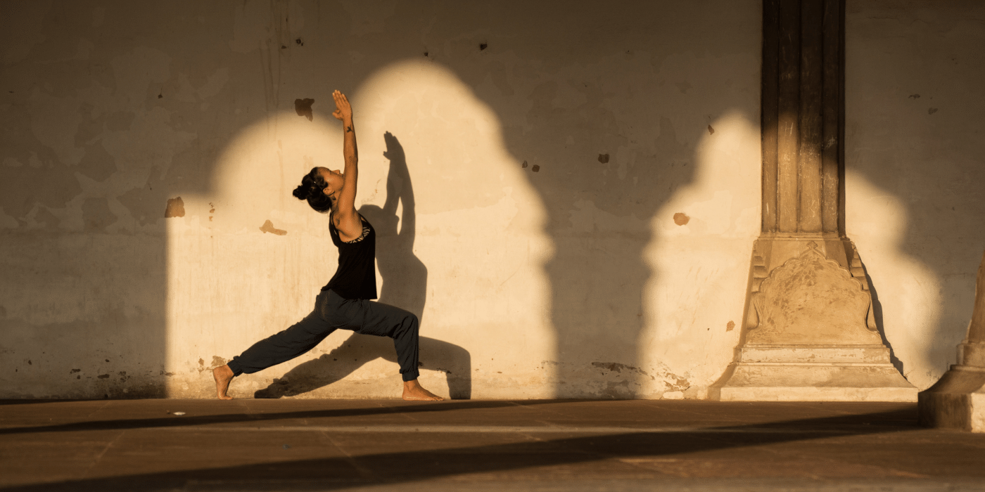 Woman practising yoga in India