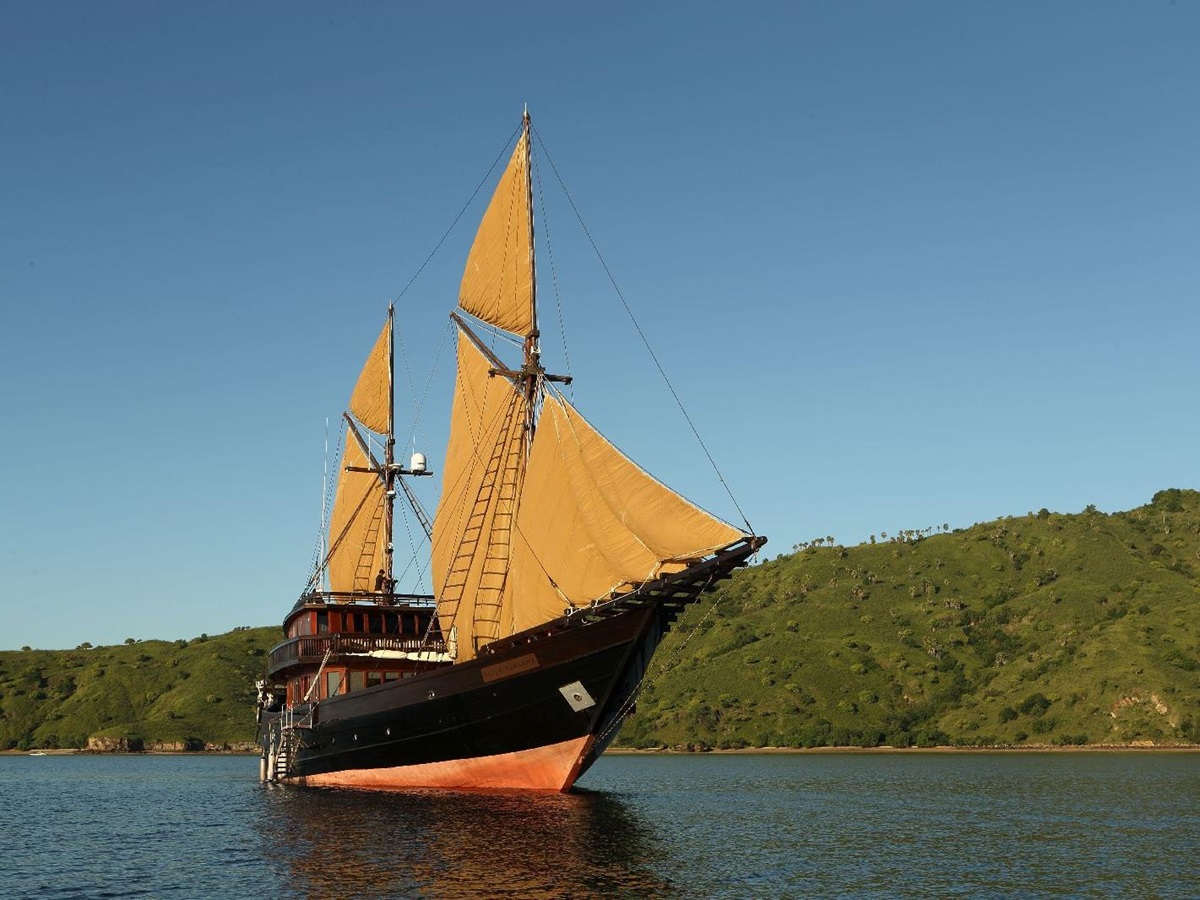 The Alila Purnama luxury phinisi at full sail in Indonesia