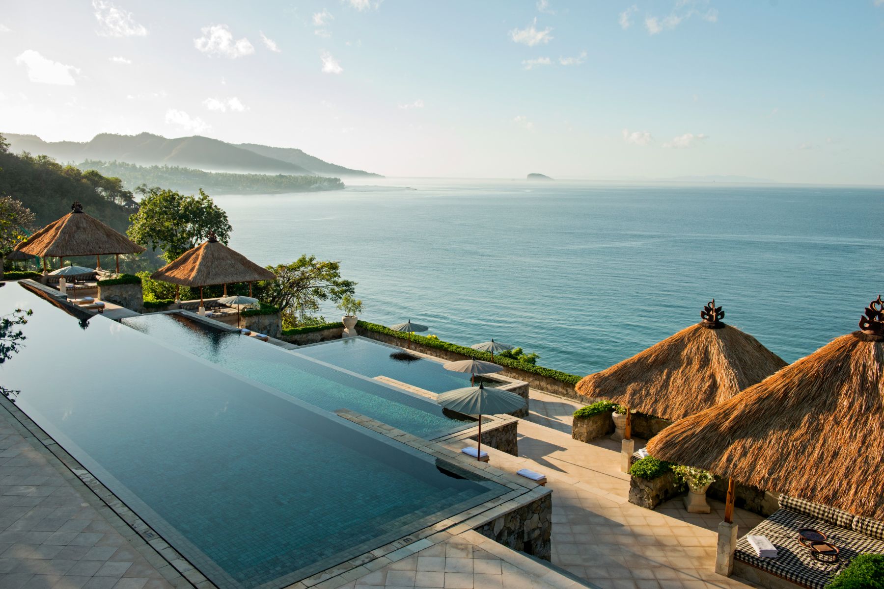 Swimming pool with ocean view at Amankila resort Bali
