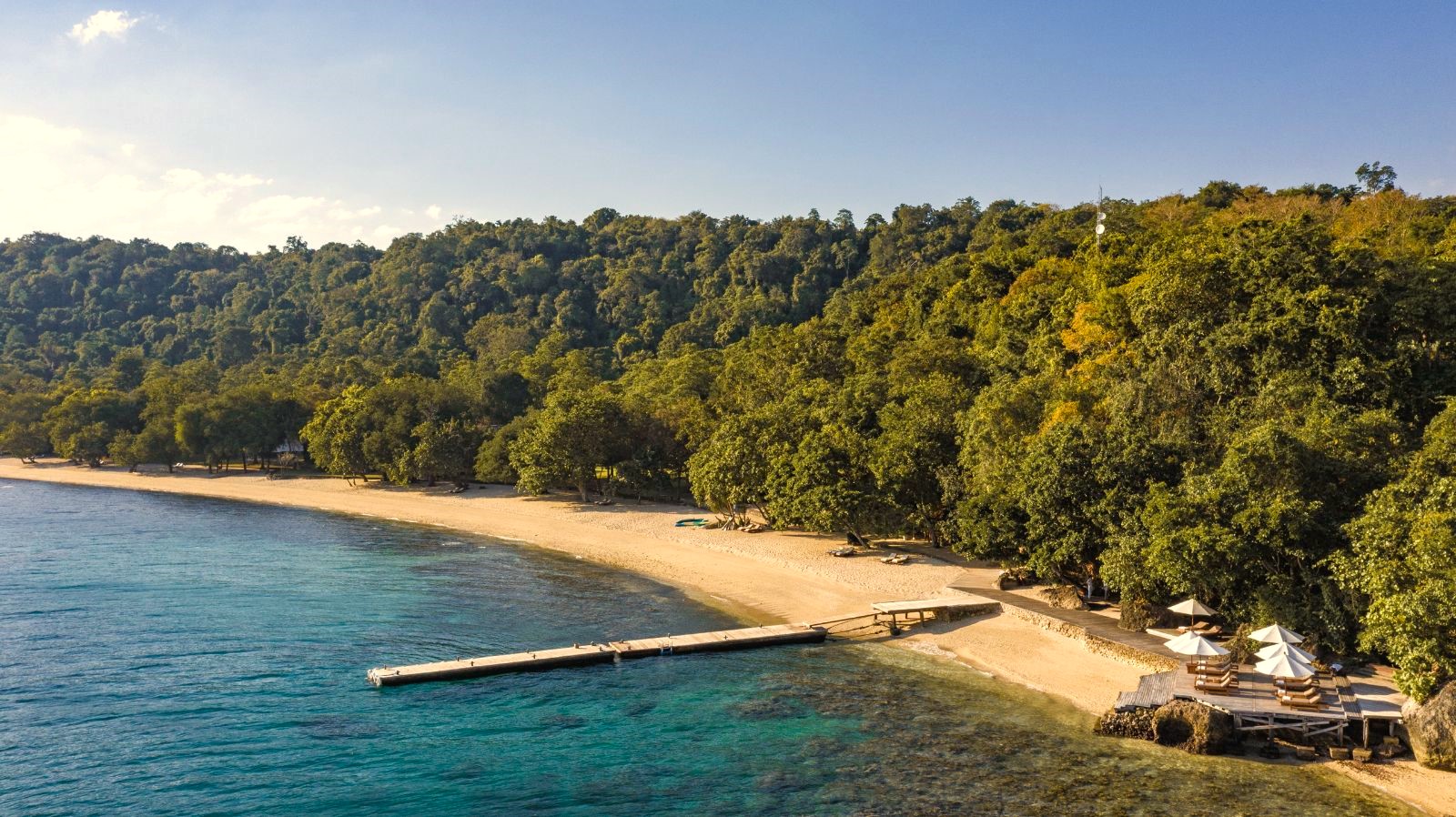Pier on the beach at Amanwana on Moyo Island