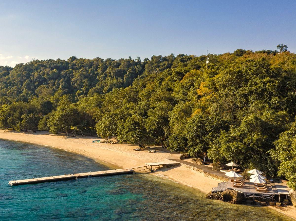 Pier on the beach at Amanwana on Moyo Island