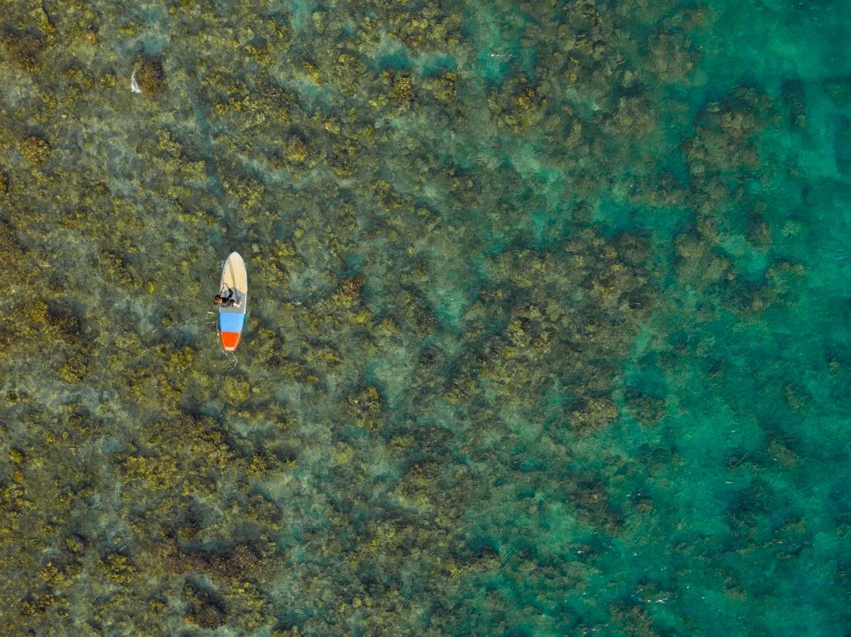 Kayaking on the waters surrounding Amanwana on Moyo Island