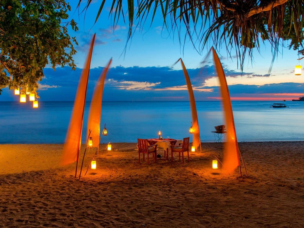 Private dining on the beach at Amanwana on Moyo Island