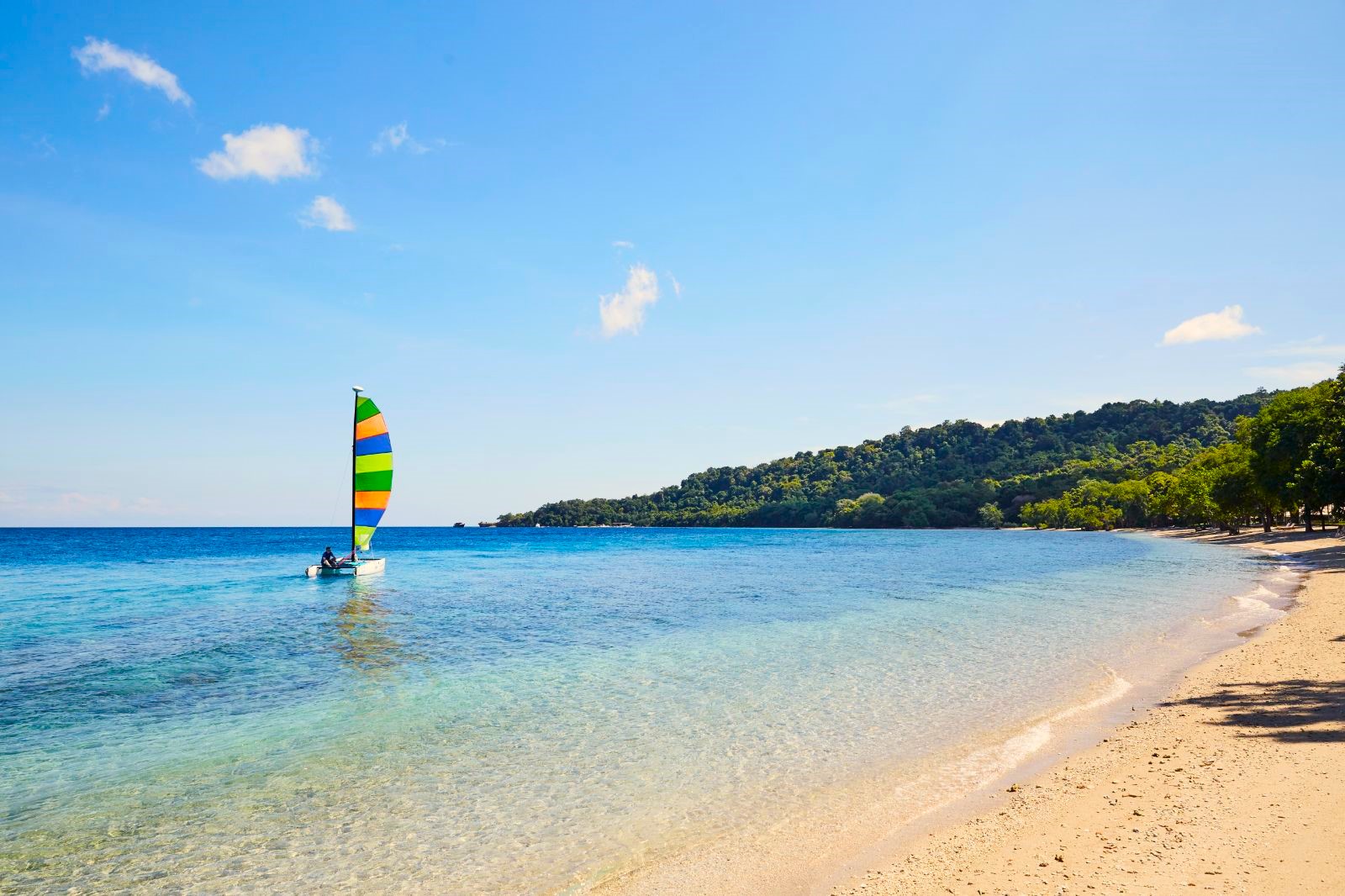 Sailing on the beach at Amanwana on Moyo Island