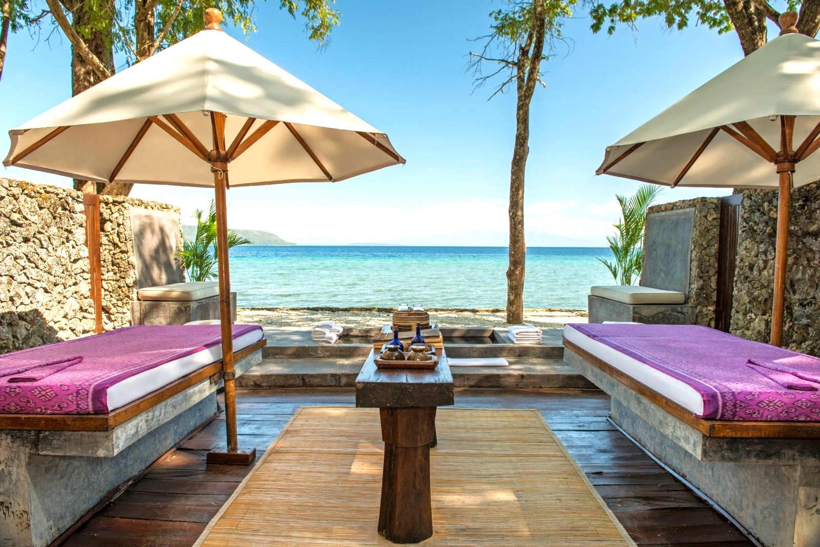 Spa beds overlooking the ocean at Amanwana on Moyo Island