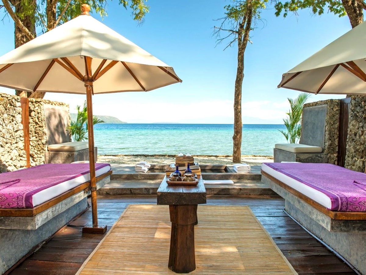 Spa beds overlooking the ocean at Amanwana on Moyo Island