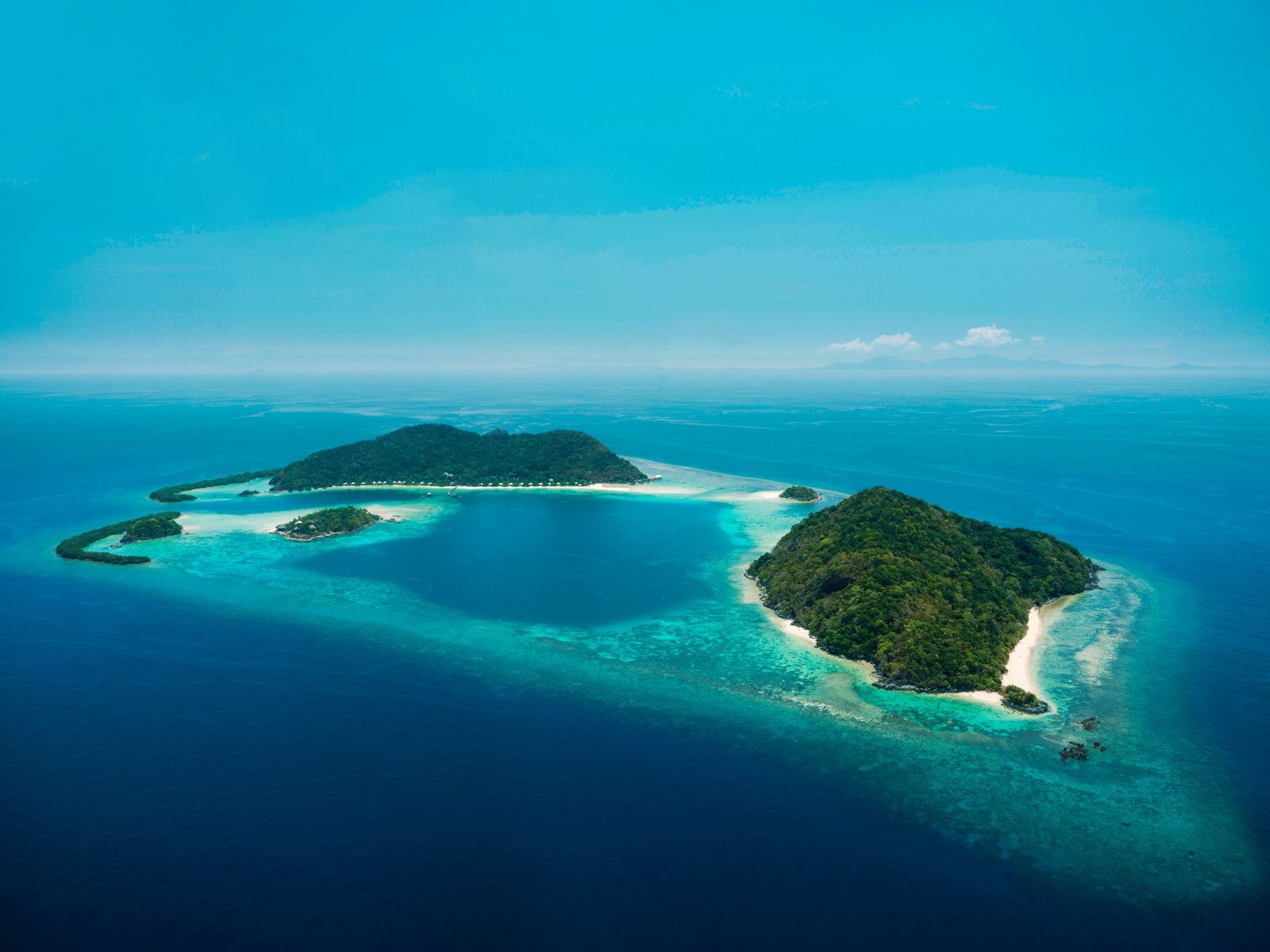 Aerial view of all the islands in the reserve at Bawah Reserve in Indonesia