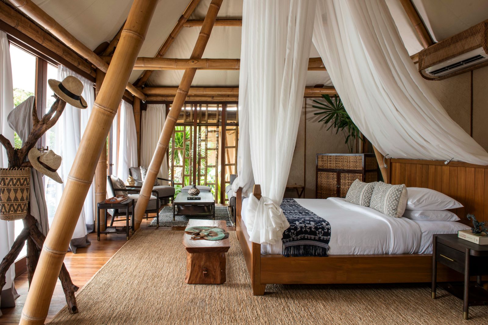 Bedroom in a deluxe pool villa at Bawah  Reserve in Indonesia
