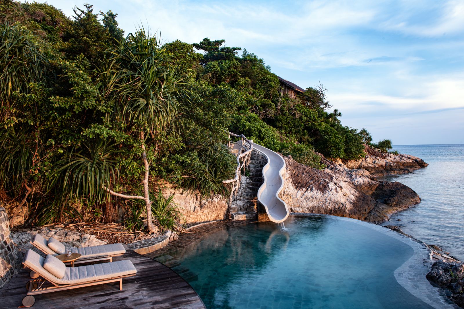 Slide and pool at the clubhouse at Bawah Reserve Indonesia