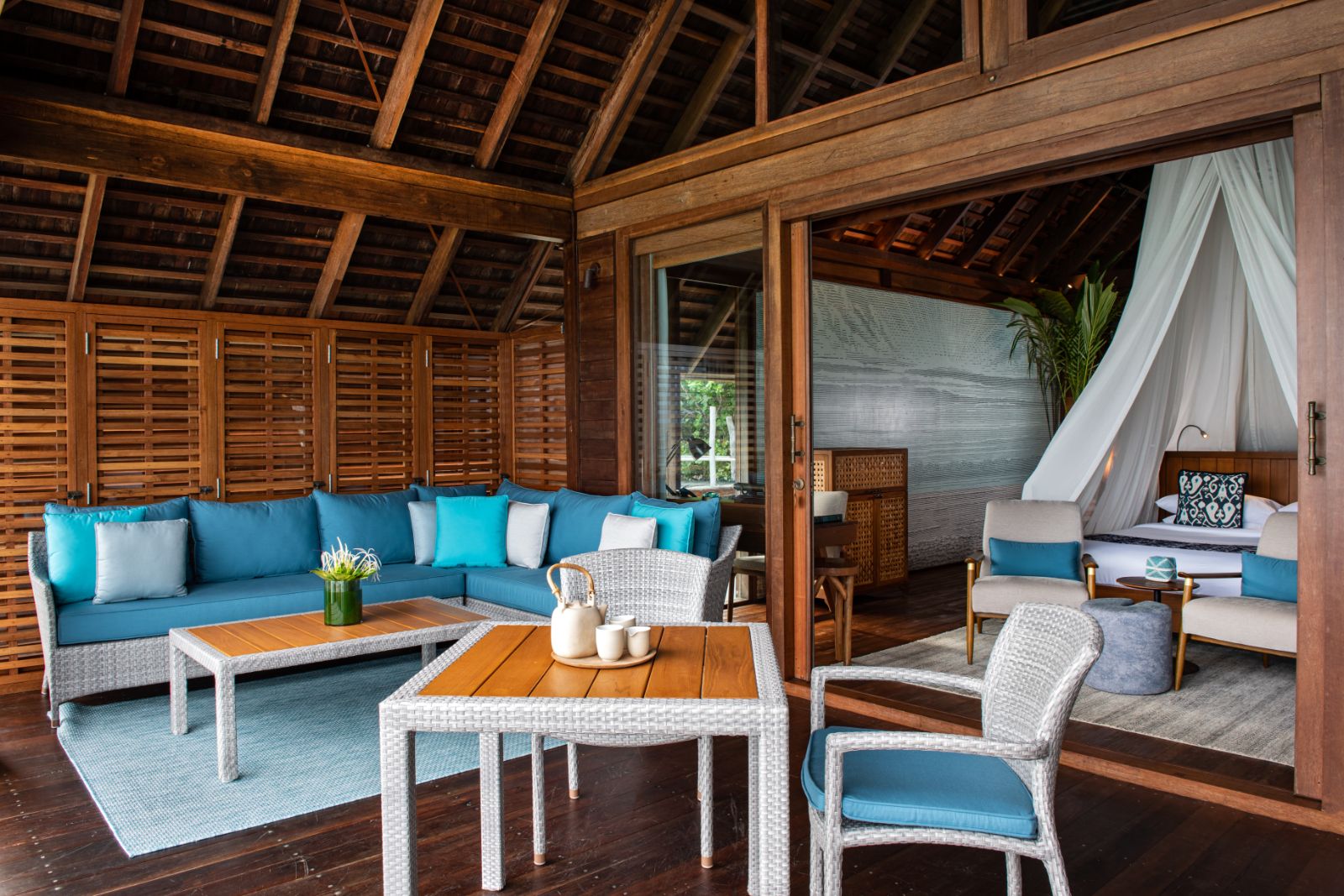 Outdoor terrace in a water villa at luxury resort Bawah  