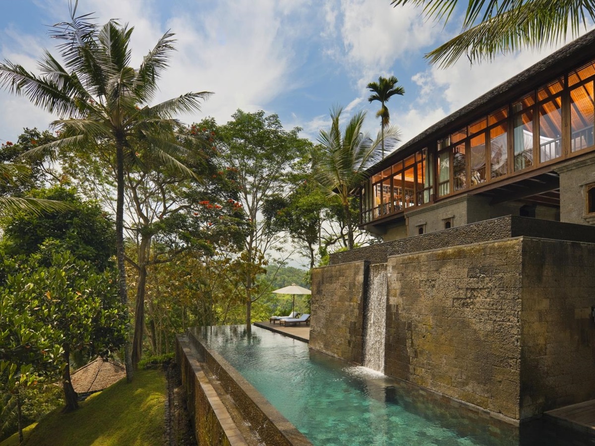 Exterior of Uma Bona residence, with waterfall and private pool