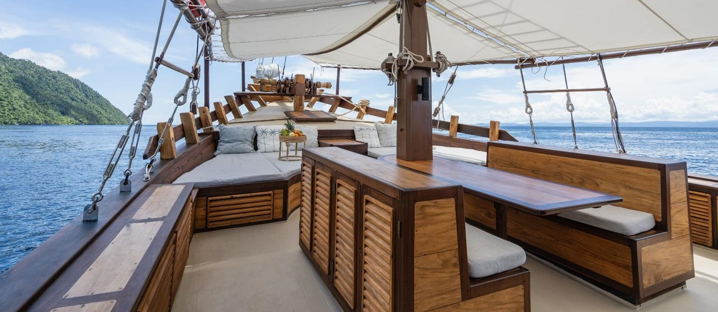 Upper outside lounge onboard the Dewata phinisi in Indonesia