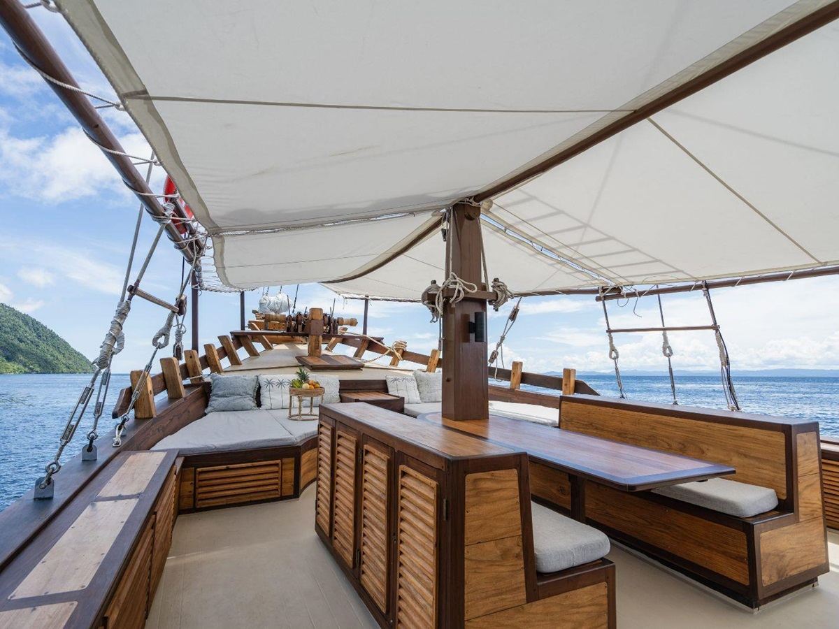 Upper outside lounge onboard the Dewata phinisi in Indonesia